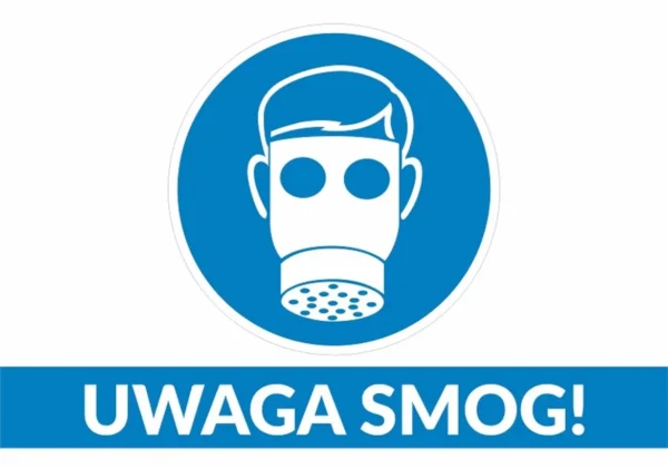 Ikona maski gazowej w niebieskim okręgu nad niebieskim paskiem z napisem „UWAGA SMOG!”.