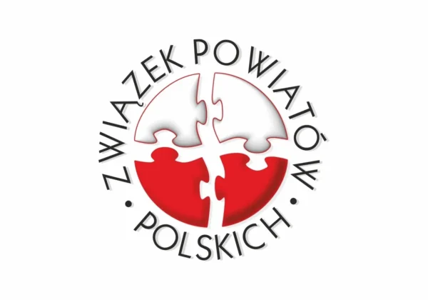 Logo Związku Powiatów Polskich przedstawiające dwa puzzle w barwach biało‑czerwonych, tworzące okrąg i symbolizujące jedność samorządów.